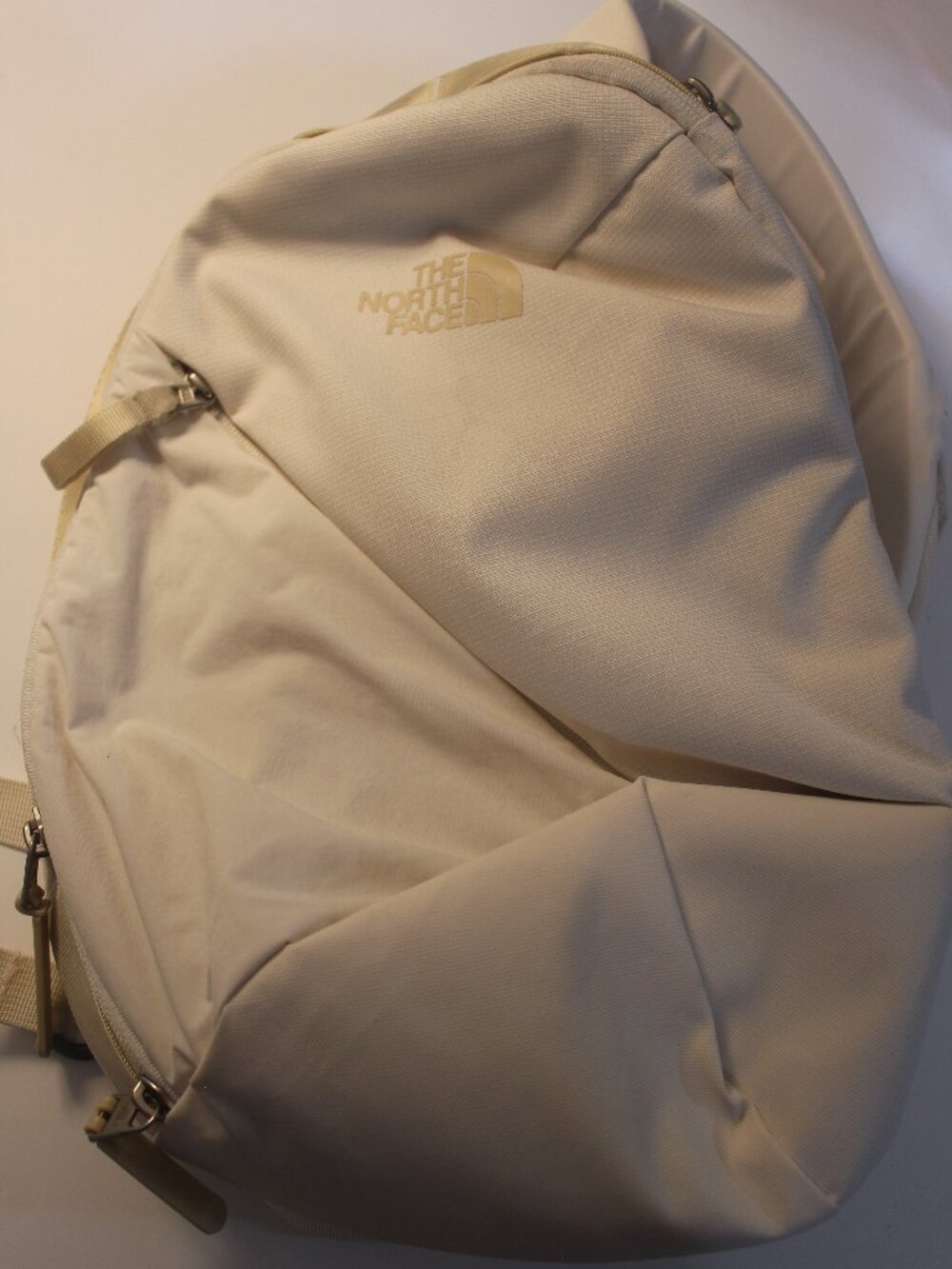 The North Face Cream Backpack With Tonal Logo